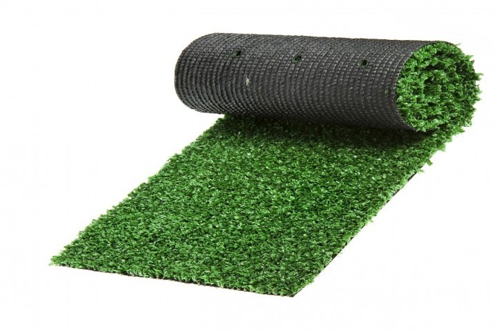 artificial rolled green grass for tennis isolated on white background